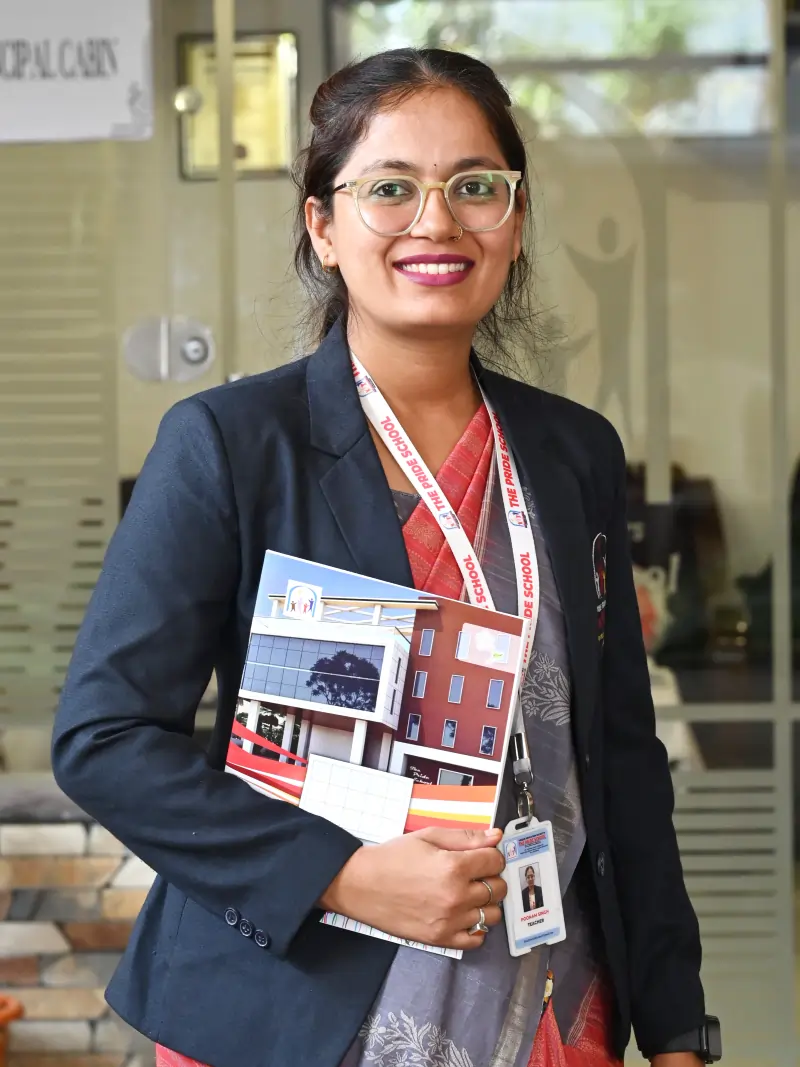 A teacher from Pride School, exemplifying dedication and commitment to quality education and mentoring students.
