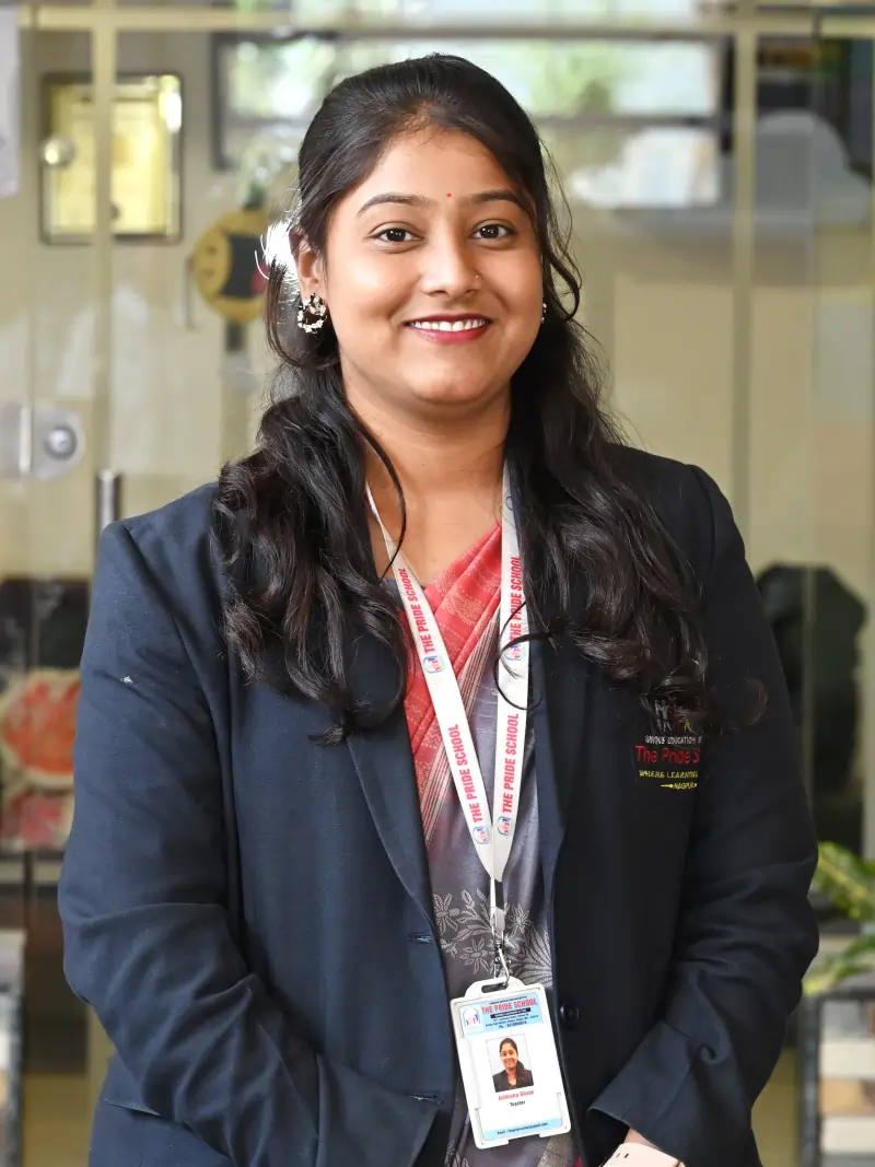 A teacher from Pride School, exemplifying dedication and commitment to quality education and mentoring students.