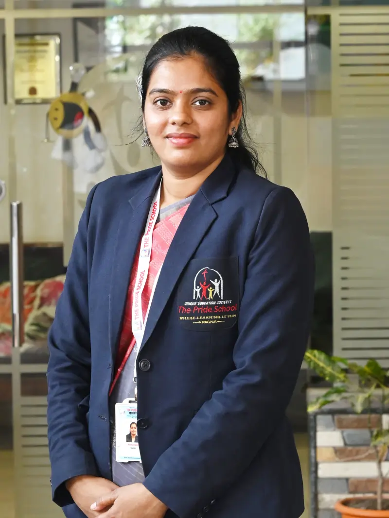 A teacher from Pride School, exemplifying dedication and commitment to quality education and mentoring students.